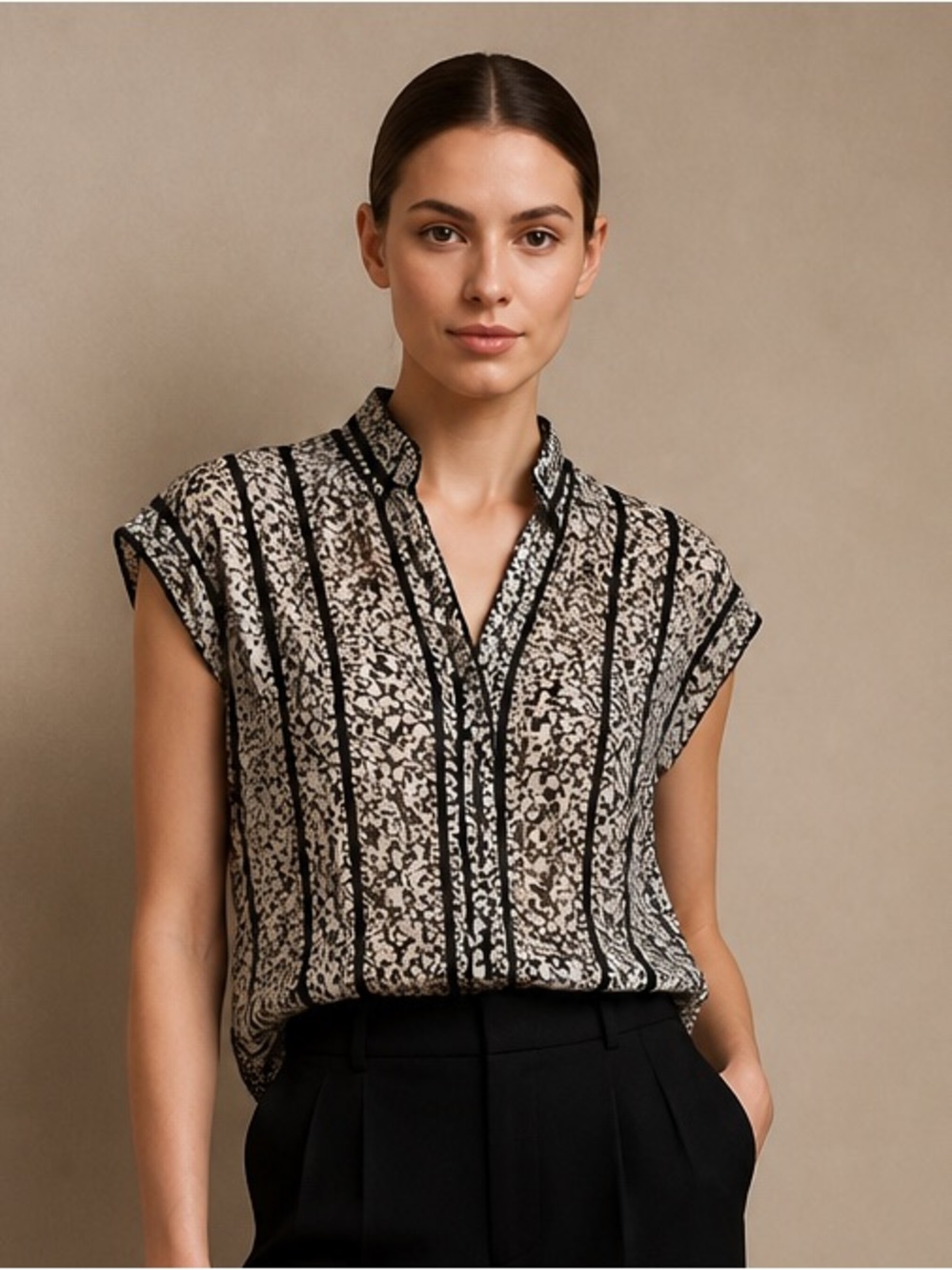 Sleeveless Black and Cream Printed V-Neck Blouse